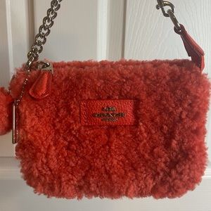 Nolita mini coach purse with care instructions  certificate of authenticity